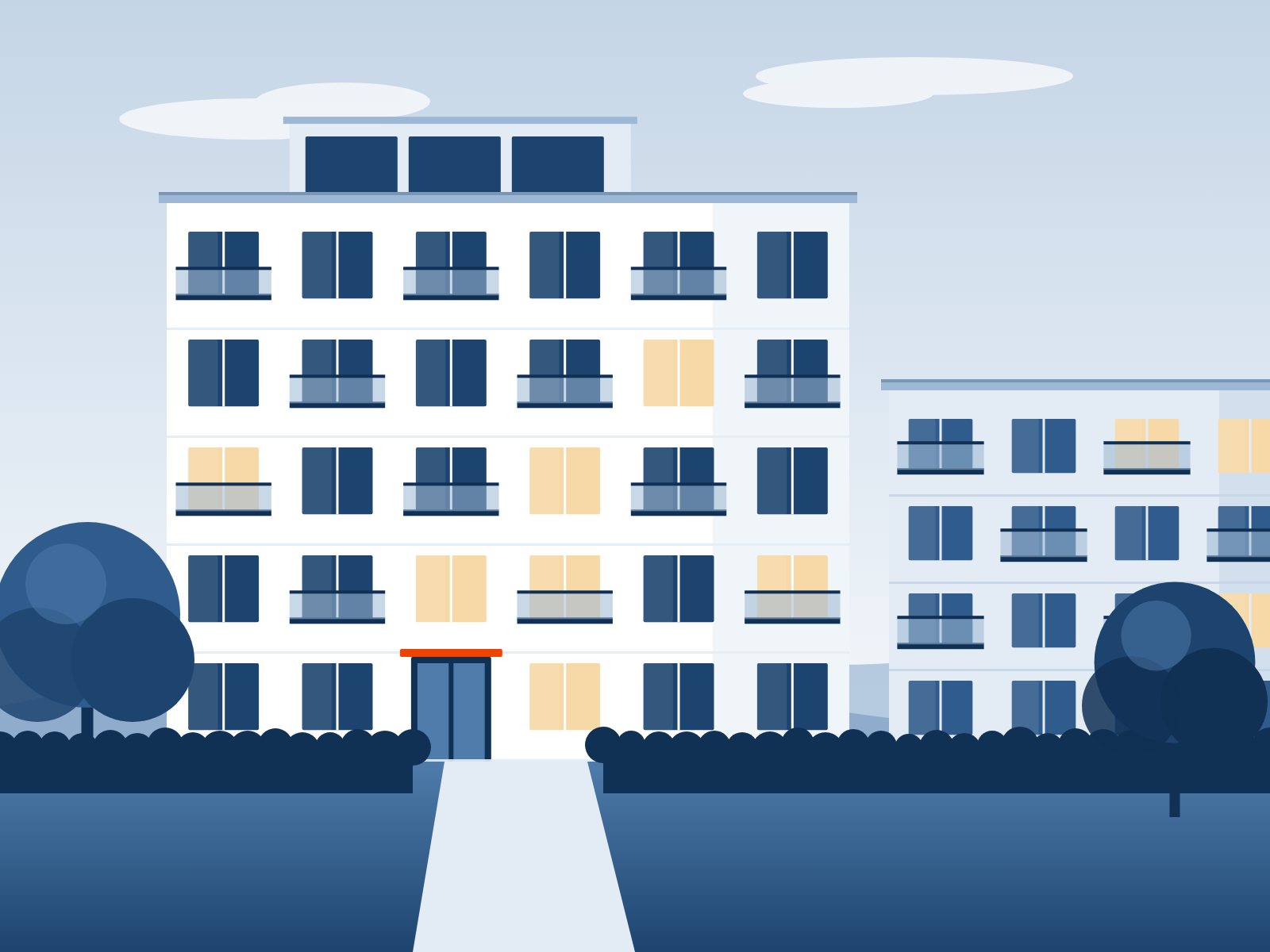 Modernes Mehrfamilienhaus mit gepflegten Außenanlagen